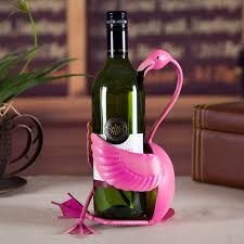 Flamingo Wine HolderDescription:
This is not only a flamingo sculpture but also a practical wine bottle holder. The pretty and cute flamingo sits on the ground, legs crossed and hands hFlamingo Wine Holder