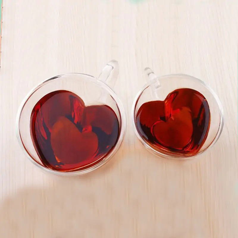Double Wall Heart Glass CupToast to Love with Every Sip Celebrate romance with our Double Wall Heart Glass Cup. Its unique heart-shaped design and double-wall insulation keep your drinks at thDouble Wall Heart Glass Cup