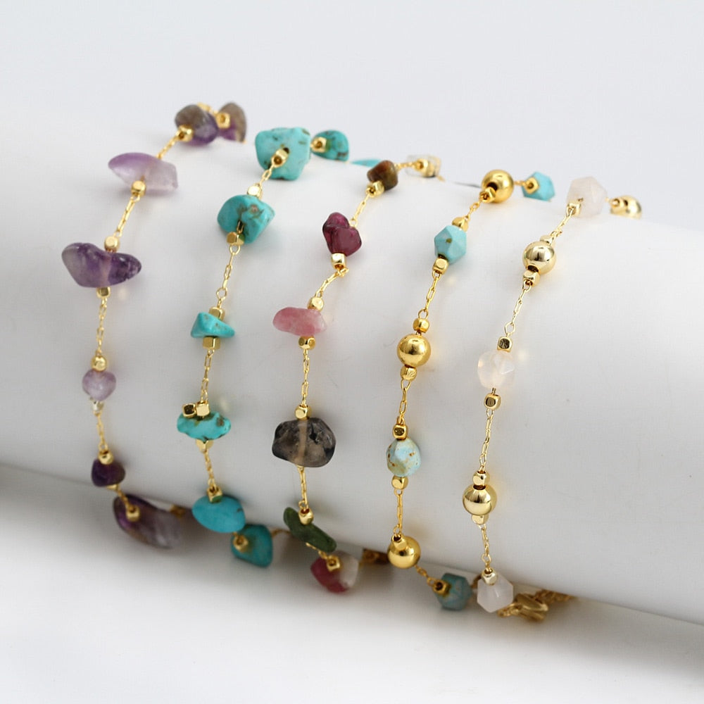 Charm BraceletIntroducing the Charm Bracelet! This beautiful bracelet is made of high quality materials, including copper, pearls, and natural stones. It's the perfect accessory tCharm Bracelet
