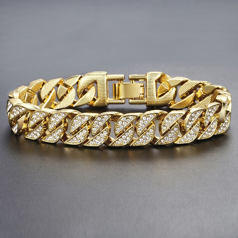 Miami Gold Curb Cuban BraceletIntroducing the Miami Gold Curb Cuban Chain Bracelet, a timeless and original piece of jewelry perfect for an elegant, sophisticated look. This beautiful bracelet isMiami Gold Curb Cuban Bracelet
