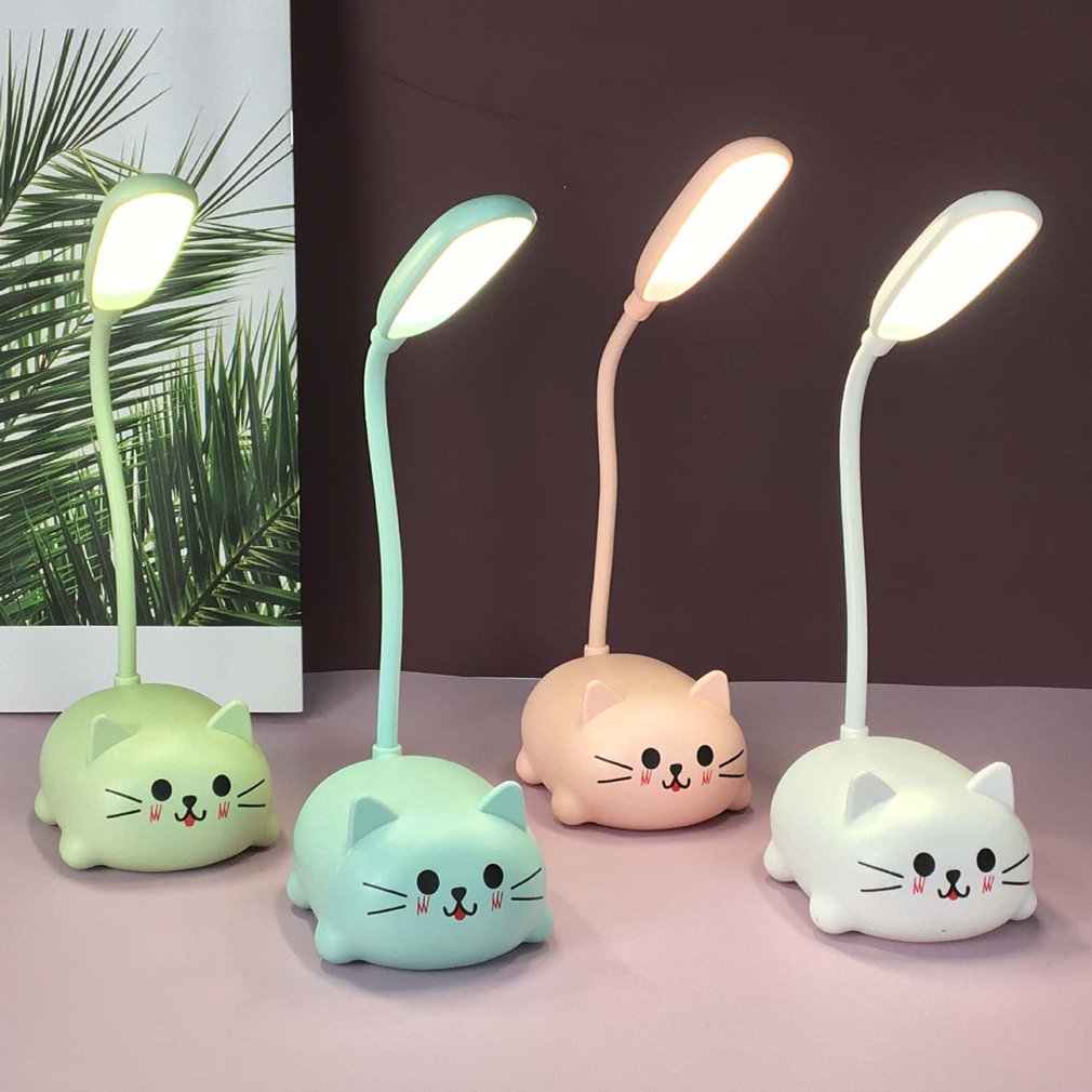 Cute Desk LampIntroducing the Cute Desk Lamp! This adorable desk lamp is perfect for kids and cat lovers alike. The cute pet cat night light is USB rechargeable and features a warCute Desk Lamp
