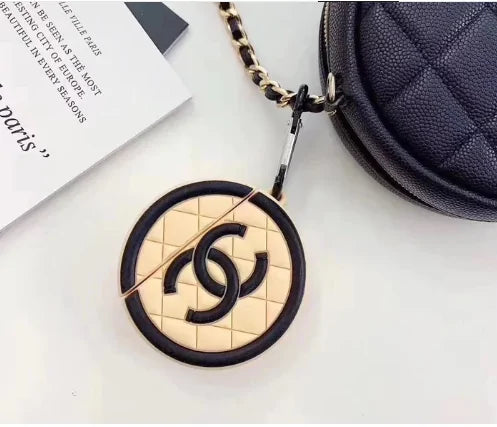 Chanel Silicone Airpod CasesChic and Protective Chanel Silicone AirPod CasesElevate your AirPods with stylish silicone cases inspired by Chanel. These cases not only protect your AirPods from sChanel Silicone Airpod Cases