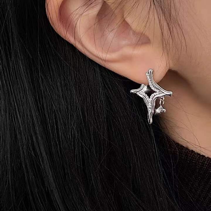 Asterism Rhinestone EarringsThe Asterism Rhinestone Earrings are a beautiful and unique piece of jewelry. They feature a metal geometry design with asterism rhinestones that make them sparkle aAsterism Rhinestone Earrings