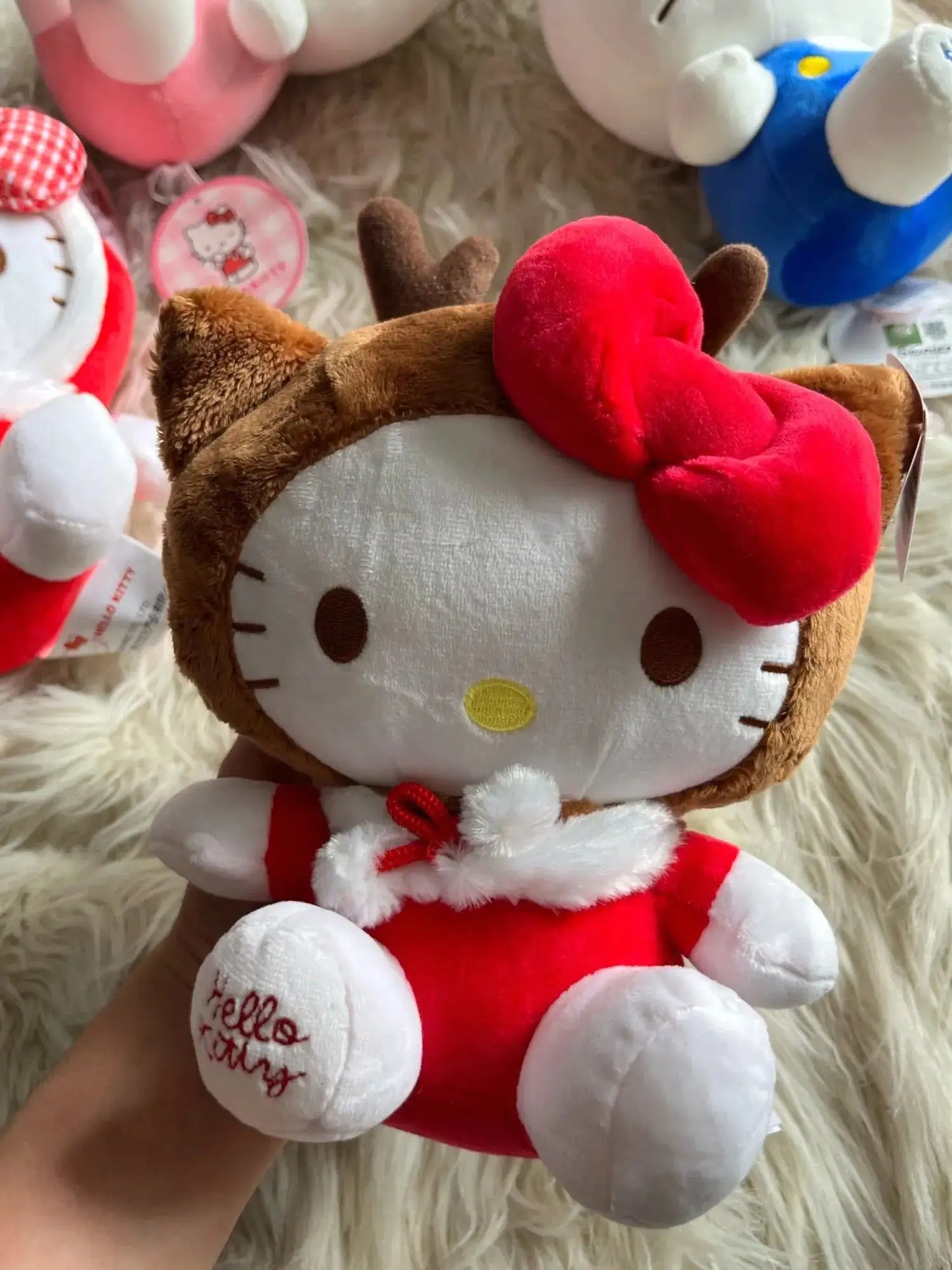 Hello Kitty Christmas Santa Reindeer PlushiesBring Holiday Cheer with Hello Kitty PlushiesCelebrate the season with the adorable Hello Kitty Christmas Santa Reindeer Plushies. These festive plushies are perfectKitty Christmas Santa Reindeer Plushies