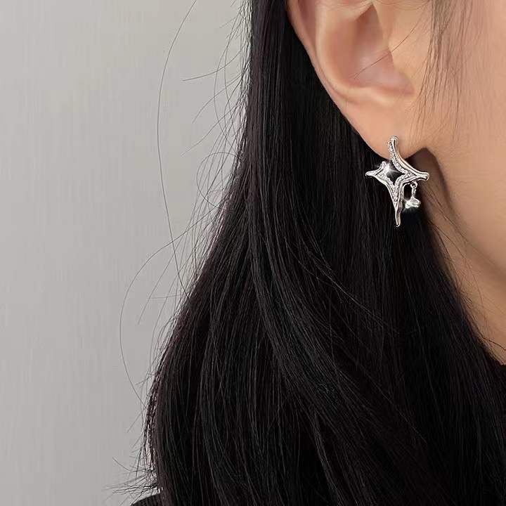 Asterism Rhinestone EarringsThe Asterism Rhinestone Earrings are a beautiful and unique piece of jewelry. They feature a metal geometry design with asterism rhinestones that make them sparkle aAsterism Rhinestone Earrings