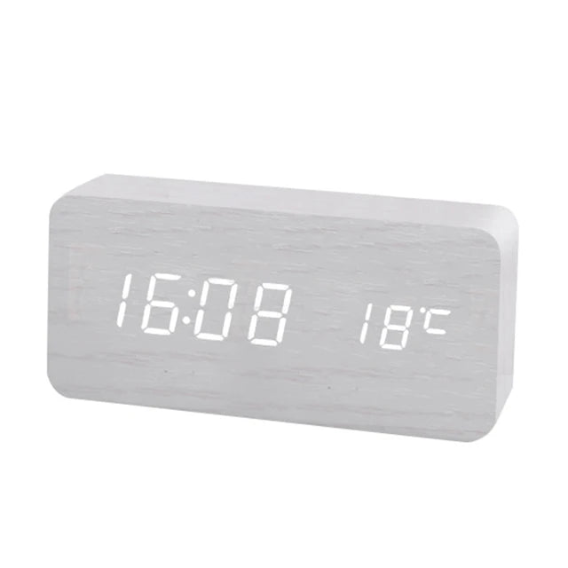 Wooden Digital Alarm ClockEnhance Your Workspace with Our Wooden Digital Alarm ClockUpgrade your office aesthetic with our wooden digital alarm clock. This LED clock doubles as a temperature Wooden Digital Alarm Clock