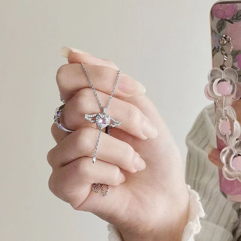 Heart Wings NecklaceMake a statement this season with our Heart Wings Necklace. This stunning piece of jewelry is designed to evoke love and emotion with its elegant heart and wings desHeart Wings Necklace