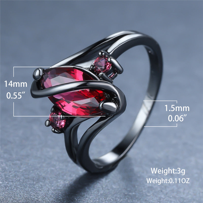 Crystal RingIntroducing the Crystal Ring â a stunning piece of jewelry that is sure to turn heads. This beautiful ring features a large red leaf crystal in the center, surrounCrystal Ring
