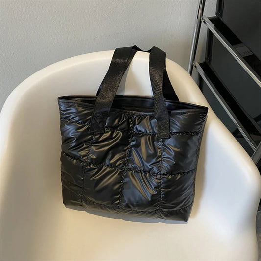 Women's black large capacity vintage quilted shoulder bag purse with rhombus pattern.
