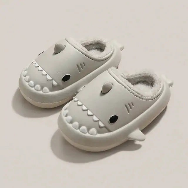 Kozyshark Fuzzy SlidesWrap your feet in comfort and style with our Kozyshark Fuzzy Slides! Designed for ultimate relaxation, these cozy slippers are the perfect companion for lazy days atKozyshark Fuzzy Slides