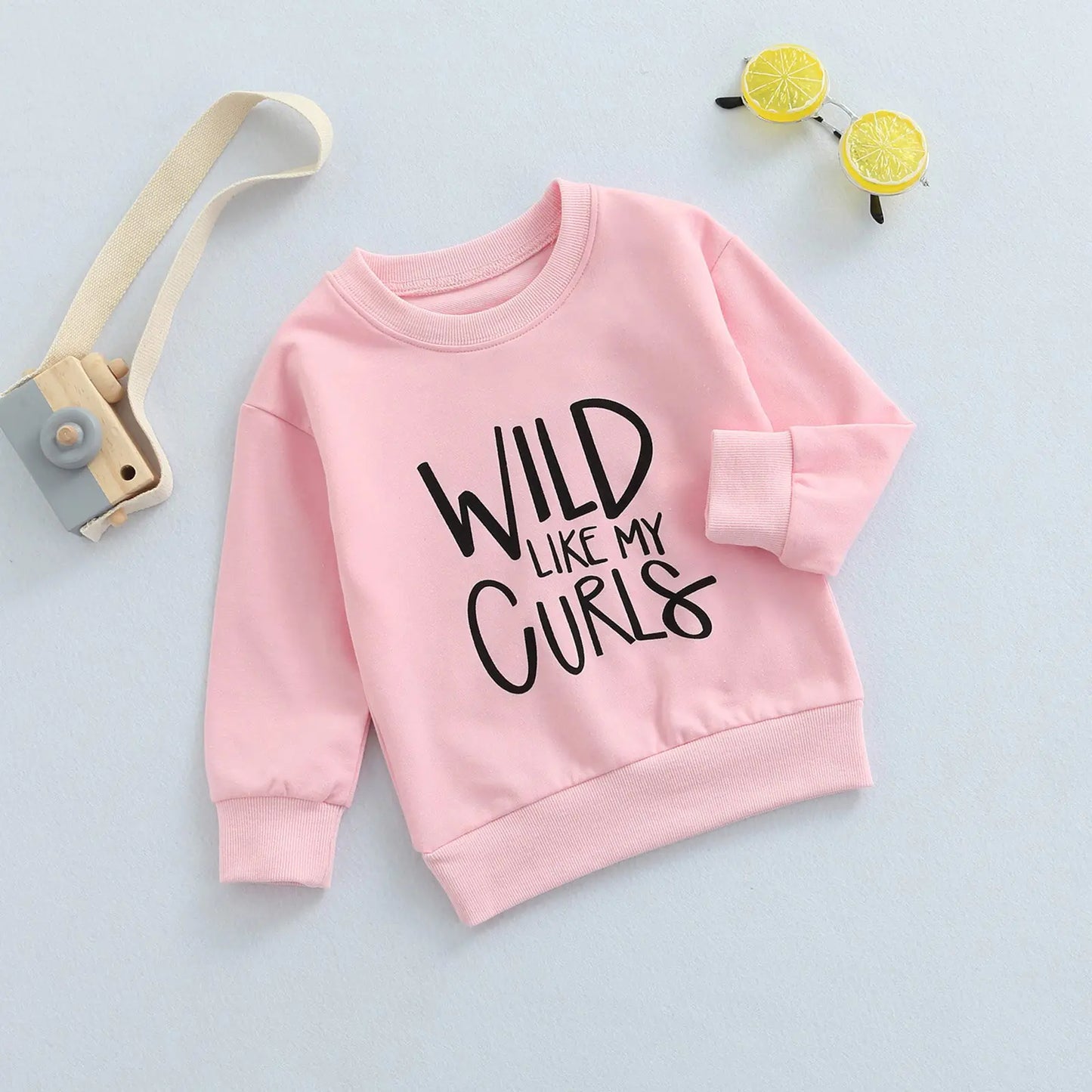 Baby Sweatshirt TopsIntroducing our latest must-have for little ones: the Baby Sweatshirt Tops with "WILD LIKE MY CURLS" Letter Print! This adorable round neck spring attire for ages 1-Baby Sweatshirt Tops