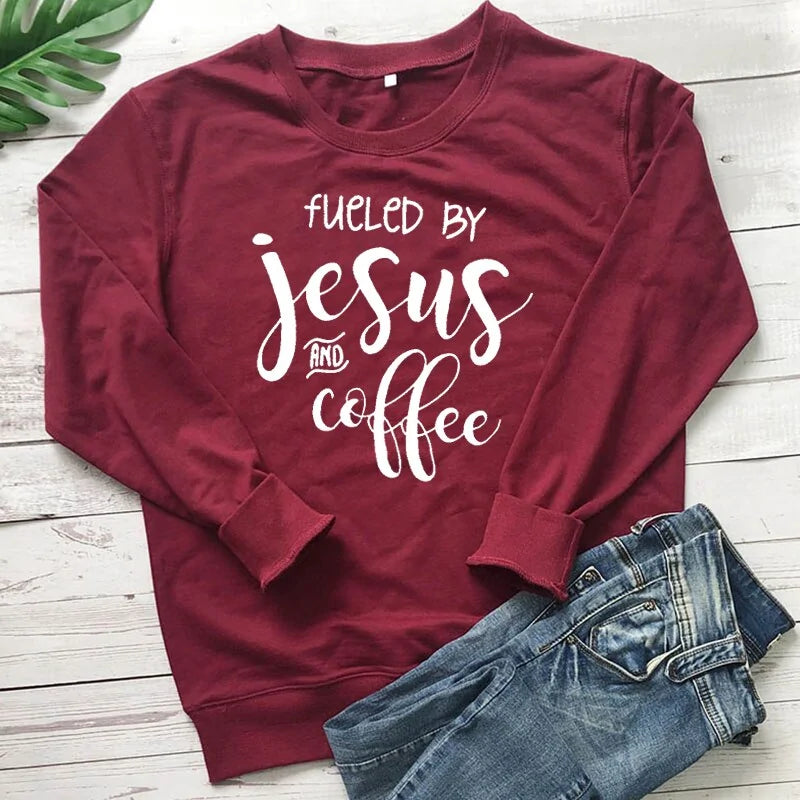 Fueled By Jesus and Coffee Sweatshirt"Indulge in pure comfort with our collection of cotton-rich apparel! Our T-shirts are crafted entirely from soft, breathable cotton, while our sweatshirts and hoodieCoffee Sweatshirt