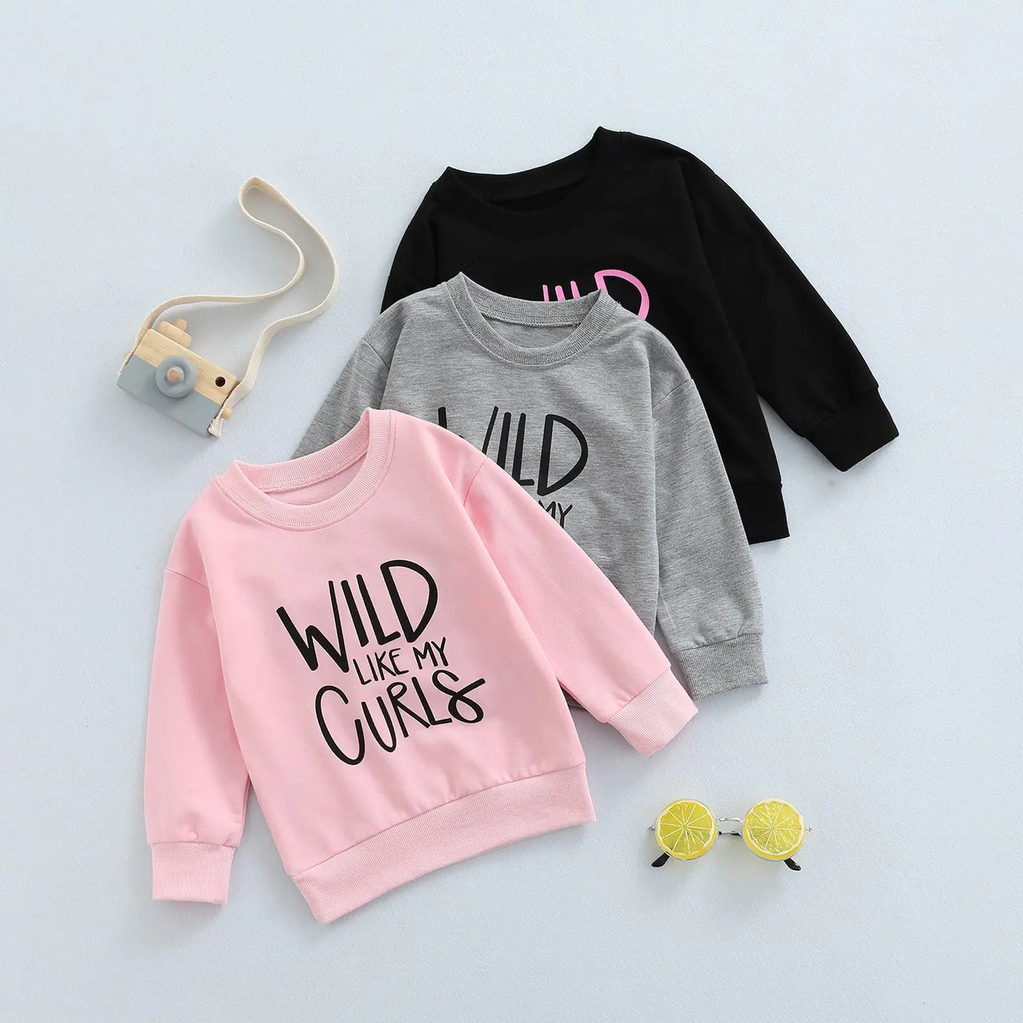 Baby Sweatshirt TopsIntroducing our latest must-have for little ones: the Baby Sweatshirt Tops with "WILD LIKE MY CURLS" Letter Print! This adorable round neck spring attire for ages 1-Baby Sweatshirt Tops