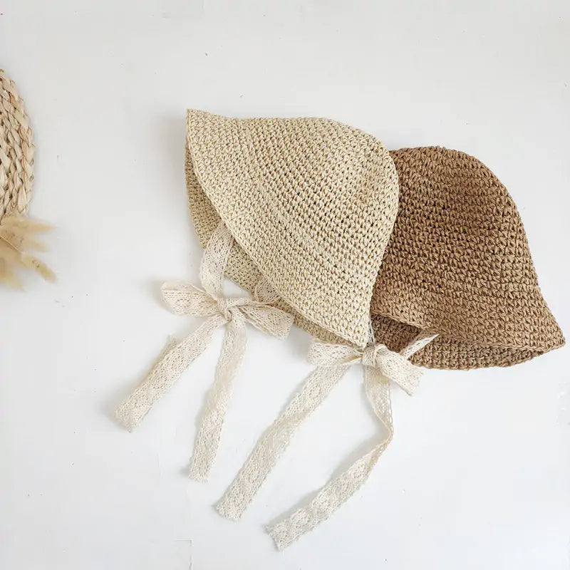 Fashion Baby HatDiscover the perfect blend of style and sun protection for your little one with our Fashion Lace Baby Hat!Chic and Sun-Safe: Made from high-quality straw and adornedFashion Baby Hat