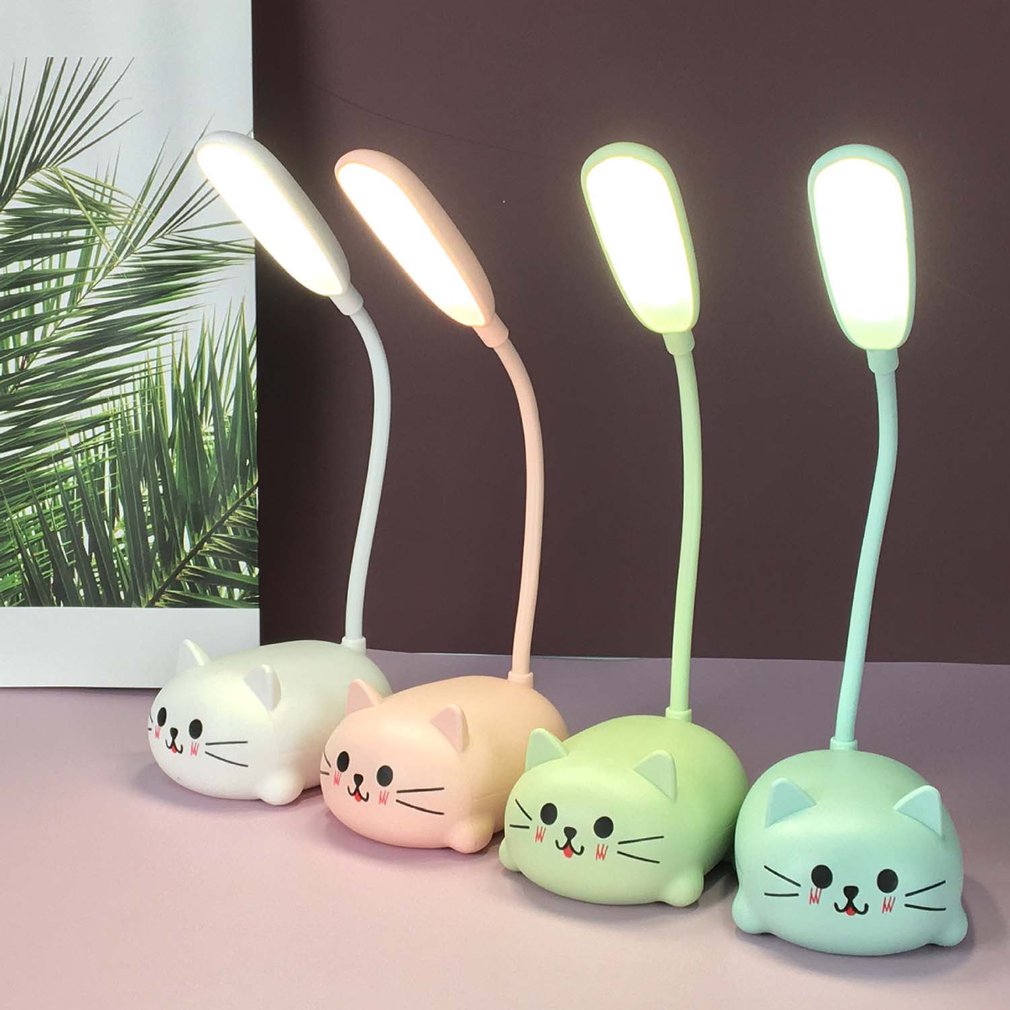 Cute Desk LampIntroducing the Cute Desk Lamp! This adorable desk lamp is perfect for kids and cat lovers alike. The cute pet cat night light is USB rechargeable and features a warCute Desk Lamp