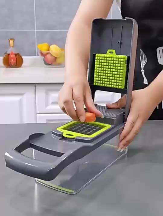 Vegetable Chopper KitchenRevolutionize your kitchen experience with our versatile Vegetable Chopper Slicer, a true multitasking marvel. This 10-piece set equips you with the essential tools Vegetable Chopper Kitchen