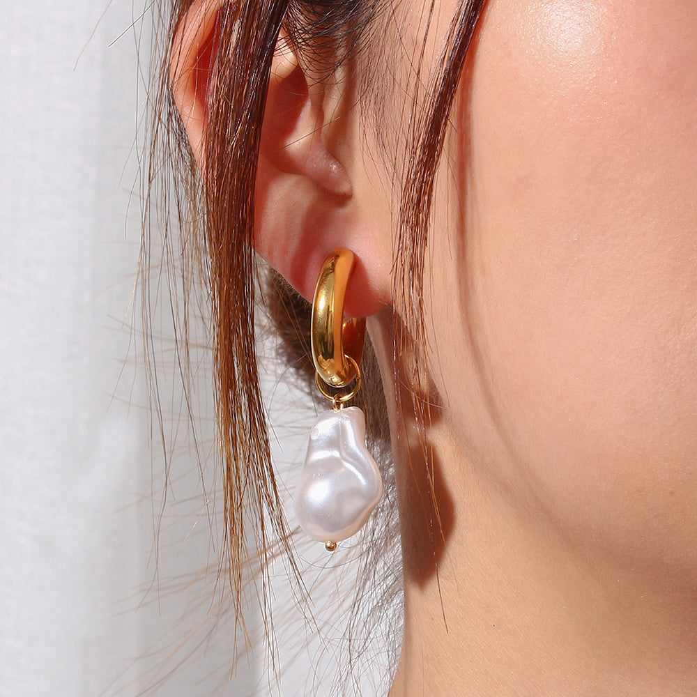 Water Drop EarringsLooking for a unique and fashionable way to accessorize? Check out these hot selling water drop earrings! Made with high quality stainless steel and gold plated for Water Drop Earrings