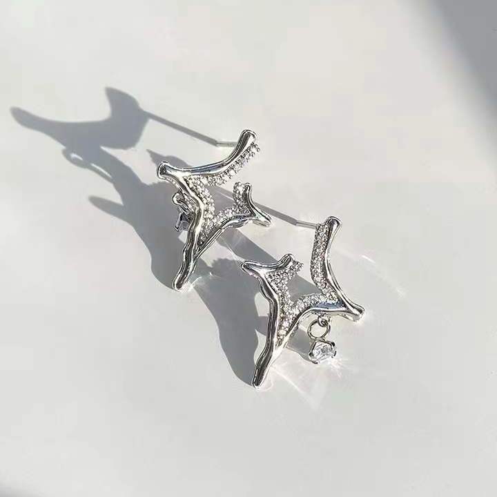 Asterism Rhinestone EarringsThe Asterism Rhinestone Earrings are a beautiful and unique piece of jewelry. They feature a metal geometry design with asterism rhinestones that make them sparkle aAsterism Rhinestone Earrings