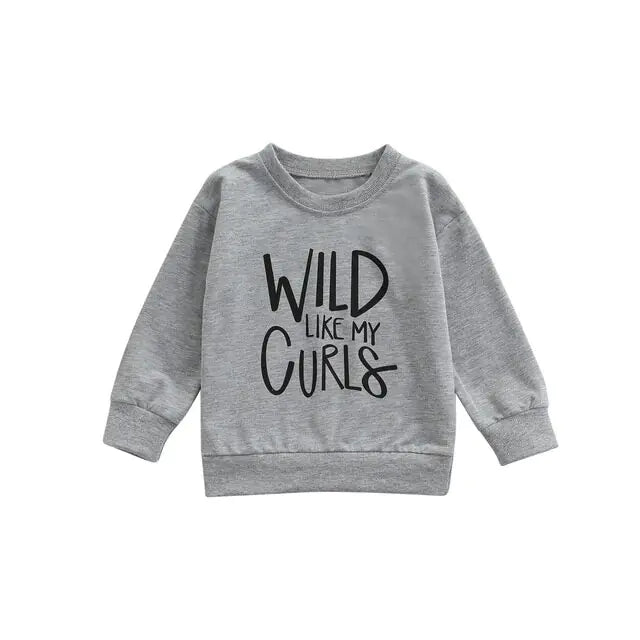 Baby Sweatshirt TopsIntroducing our latest must-have for little ones: the Baby Sweatshirt Tops with "WILD LIKE MY CURLS" Letter Print! This adorable round neck spring attire for ages 1-Baby Sweatshirt Tops