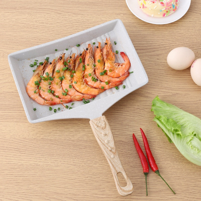 Non-Stick Wave Bottom SaucepanIntroducing the Non-Stick Wave Bottom Tamagoyaki Omelette Saucepan, a versatile frying pan designed specifically for creating delicious and perfectly rolled Japanese-Stick Wave Bottom Saucepan