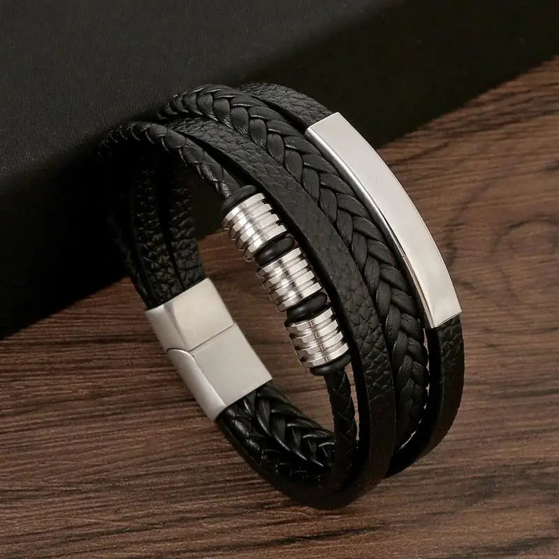 Classic Men's Leather Bracelet New Style Hand-woven Multi-layer CombinName: Alloy buckle leather bracelet
Material: leather, alloy
Process: frosted magnetic buckle
Color: Steel/Gold/Black
Size: 19/21/23
Packaging specification: 1 pieceClassic Men'