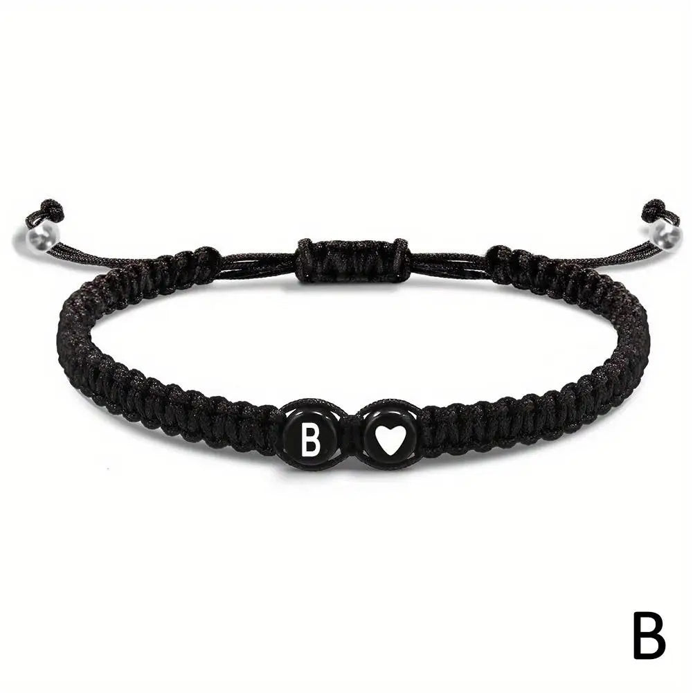 26 Letters Initial Heart Bracelets Handmade Adjustable A-Z Name BraideProduct Description:
1. Product name: 26 letters bracelet
2. Chain length: 17.5+6cm (6.89+2.36in),
3. Product color: black
4. Product material: rope
Features:
1.Thi26 Letters Initial Heart Bracelets Handmade Adjustable