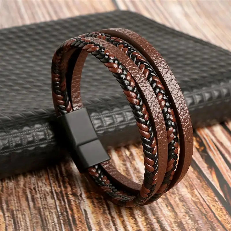 Classic Men's Leather Bracelet New Style Hand-woven Multi-layer CombinName: Alloy buckle leather bracelet
Material: leather, alloy
Process: frosted magnetic buckle
Color: Steel/Gold/Black
Size: 19/21/23
Packaging specification: 1 pieceClassic Men'