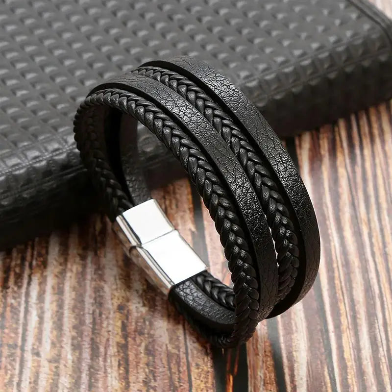 Classic Men's Leather Bracelet New Style Hand-woven Multi-layer CombinName: Alloy buckle leather bracelet
Material: leather, alloy
Process: frosted magnetic buckle
Color: Steel/Gold/Black
Size: 19/21/23
Packaging specification: 1 pieceClassic Men'