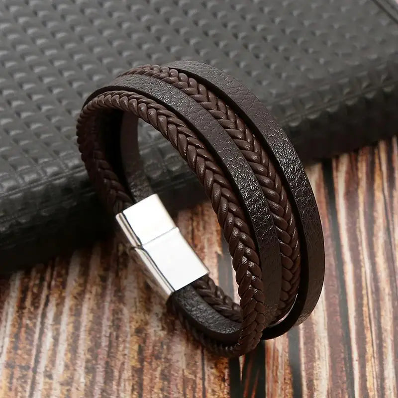 Classic Men's Leather Bracelet New Style Hand-woven Multi-layer CombinName: Alloy buckle leather bracelet
Material: leather, alloy
Process: frosted magnetic buckle
Color: Steel/Gold/Black
Size: 19/21/23
Packaging specification: 1 pieceClassic Men'