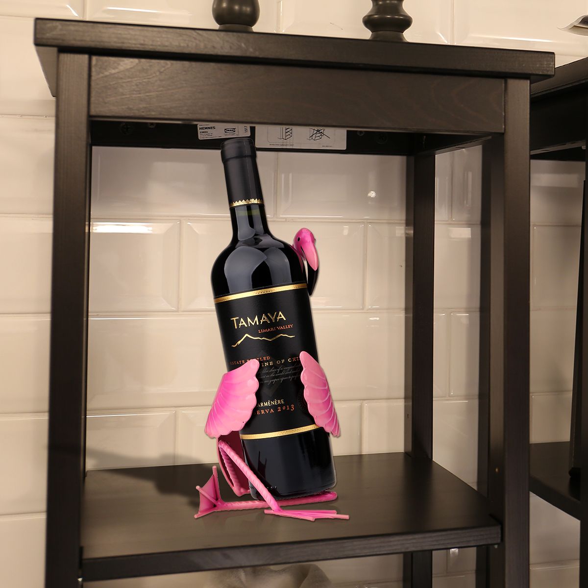 Flamingo Wine HolderDescription:
This is not only a flamingo sculpture but also a practical wine bottle holder. The pretty and cute flamingo sits on the ground, legs crossed and hands hFlamingo Wine Holder