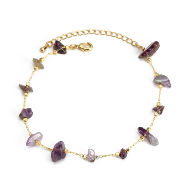 Charm BraceletIntroducing the Charm Bracelet! This beautiful bracelet is made of high quality materials, including copper, pearls, and natural stones. It's the perfect accessory tCharm Bracelet