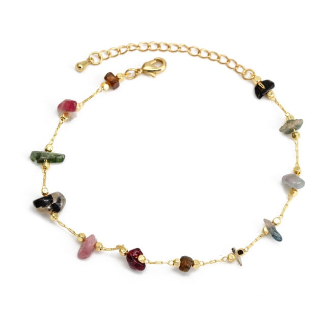 Charm BraceletIntroducing the Charm Bracelet! This beautiful bracelet is made of high quality materials, including copper, pearls, and natural stones. It's the perfect accessory tCharm Bracelet