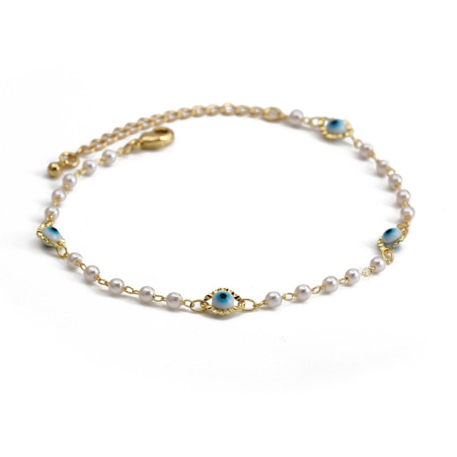 Charm BraceletIntroducing the Charm Bracelet! This beautiful bracelet is made of high quality materials, including copper, pearls, and natural stones. It's the perfect accessory tCharm Bracelet