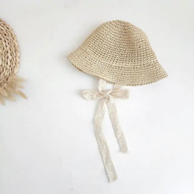 Fashion Baby HatDiscover the perfect blend of style and sun protection for your little one with our Fashion Lace Baby Hat!Chic and Sun-Safe: Made from high-quality straw and adornedFashion Baby Hat