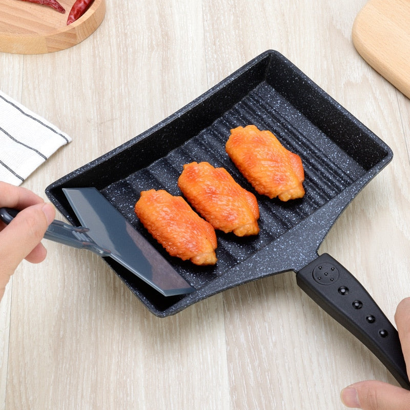 Non-Stick Wave Bottom SaucepanIntroducing the Non-Stick Wave Bottom Tamagoyaki Omelette Saucepan, a versatile frying pan designed specifically for creating delicious and perfectly rolled Japanese-Stick Wave Bottom Saucepan
