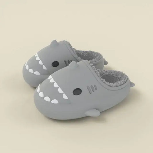 Kozyshark Fuzzy SlidesWrap your feet in comfort and style with our Kozyshark Fuzzy Slides! Designed for ultimate relaxation, these cozy slippers are the perfect companion for lazy days atKozyshark Fuzzy Slides