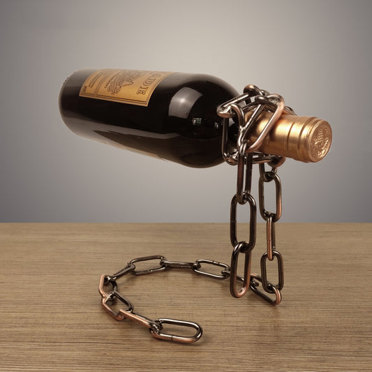 Magic Iron Chain Wine Bottle HolderIntroducing the Magic Iron Chain Wine Bottle Holder - the perfect way to add a touch of flair and elegance to any home bar or kitchen. Crafted from high-quality ironMagic Iron Chain Wine Bottle Holder