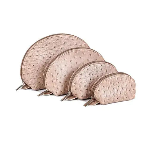 COSMO Cosmetic Faux Ostrich Cases In Set of 4Carry all your makeup essentials in the COSMO Cosmetic Faux Ostrich Cases in Set of 4 and be a true Cosmopolitan traveler in the real sense of the term!  
The COSMO COSMO Cosmetic Faux Ostrich Cases