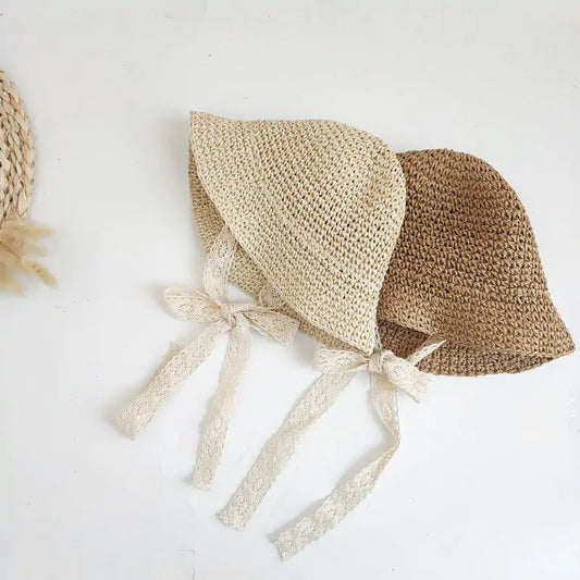 Fashion Baby HatDiscover the perfect blend of style and sun protection for your little one with our Fashion Lace Baby Hat!Chic and Sun-Safe: Made from high-quality straw and adornedFashion Baby Hat
